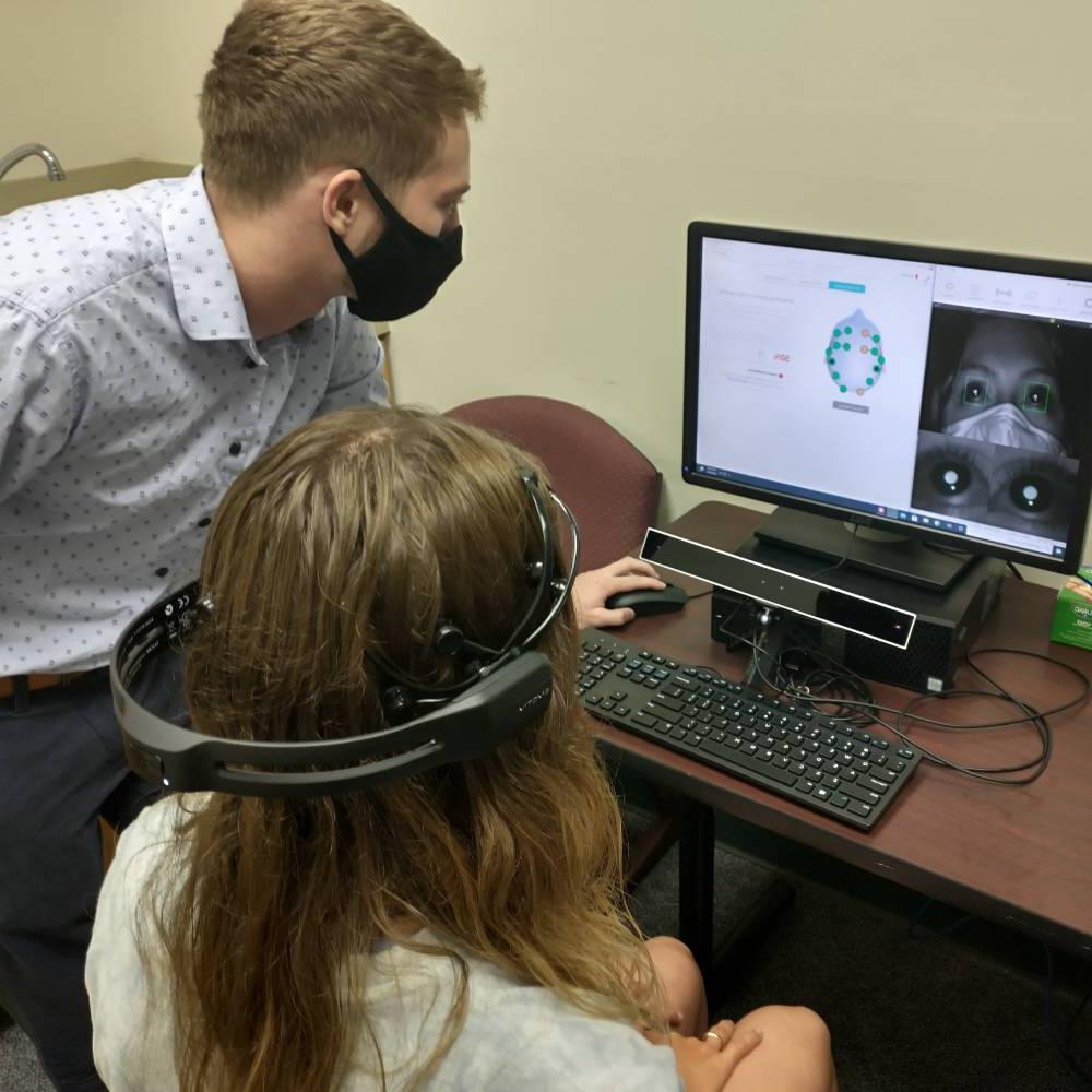 Researchers in the eye-tracking lab